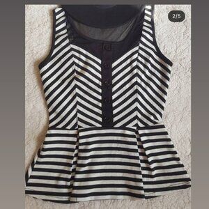 Pretty black and white peplum top.